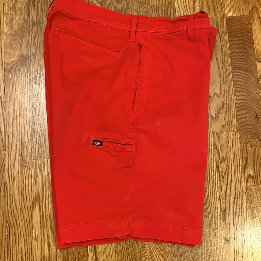 The north face red men’s long shorts, size 34